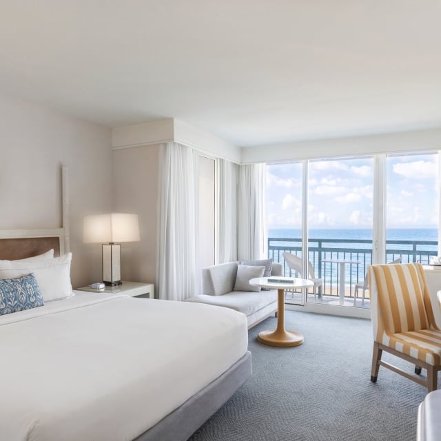 Spacious beachfront suite with panoramic ocean views and elegant decor at The Singer Resort in West Palm Beach
