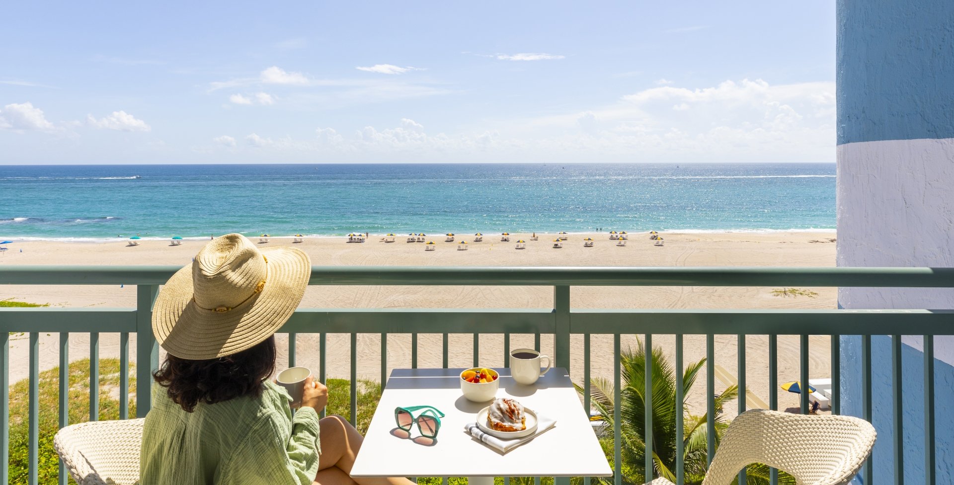 woman having coffee on the balcony