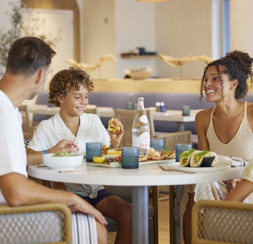 family enjoying lunch at caretta caretta