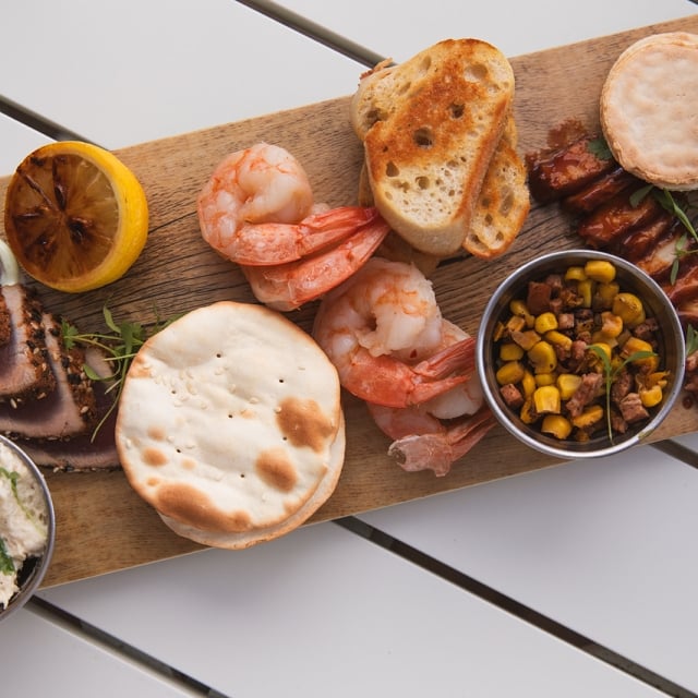 seafood board with fish dip and shrimp